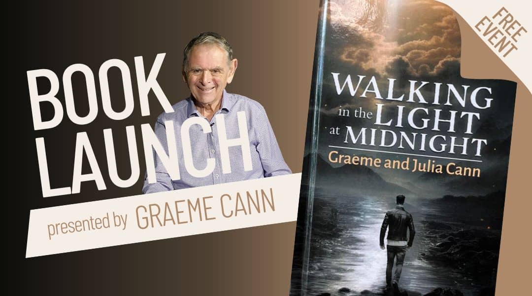 Image of a book called Walking in the light at midnight. Dark cover with man walking in water. Graeme Cann photo beside the book and he is in his eighties wearing a shirt.