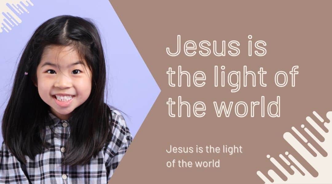 young asian girl about six years old wearing a black and white flannel shirt. Jesus is the light of the world.