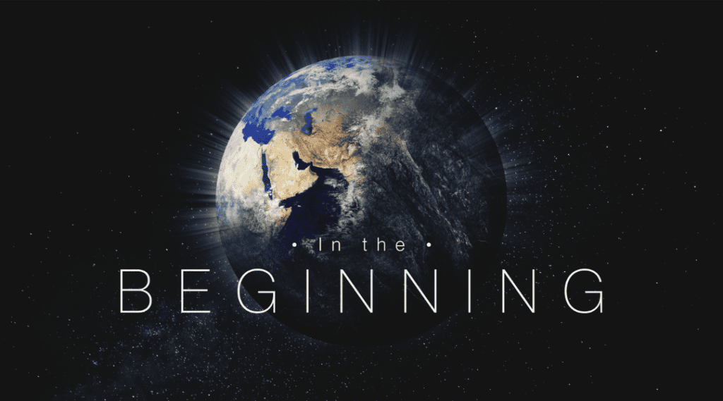 Dark space with large Earth shining bright. Title: In The Beginning.