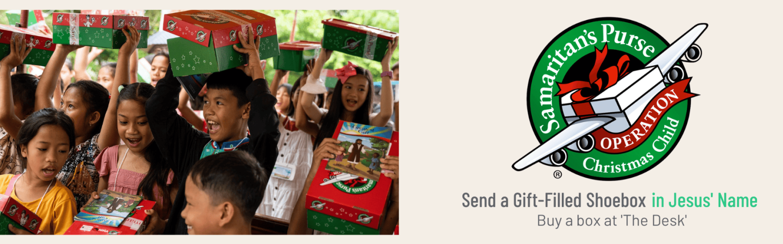Image of happy children holding their Shoe Box full of Christmas gifts.