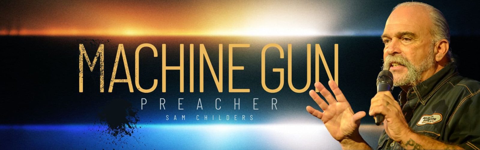 Machine Gun Preacher Sam Childer who is a senior man wearing a bikie outfit.